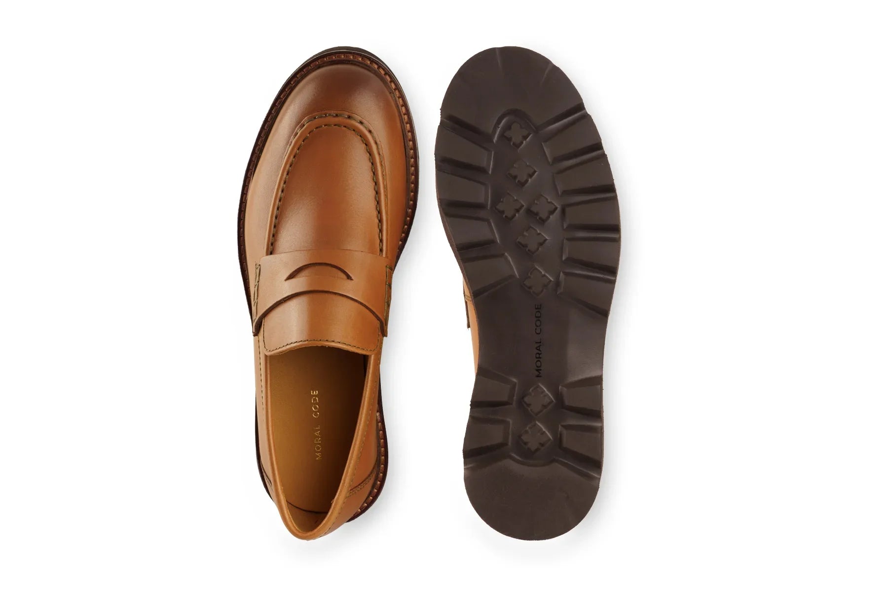 Men's tan leather penny loafer with rugged black rubber sole, shown top and bottom view