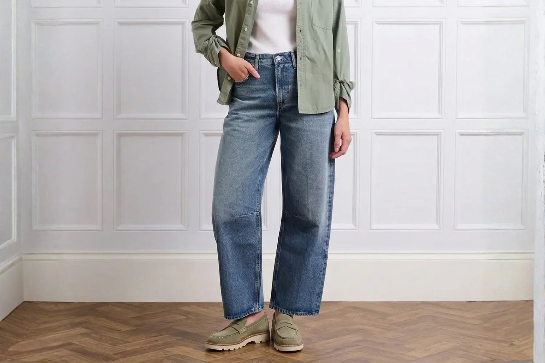 Sage green suede loafers with rubber sole styled with jeans and a green 
shirt   