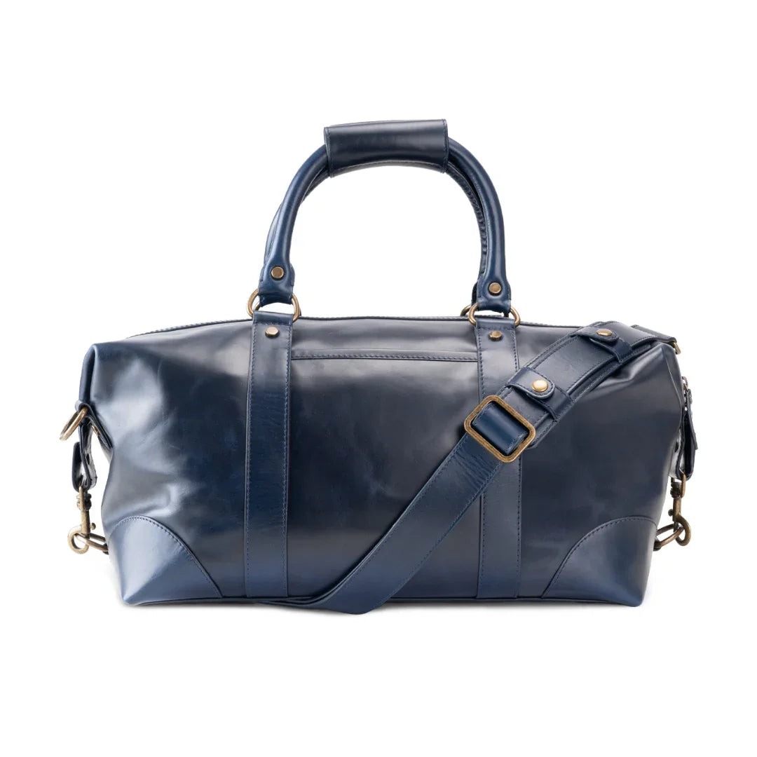 Blue leather duffel bag with gold accents 