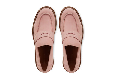 Pair of pink leather men's loafers with brown soles, displayed top-down on a white background  