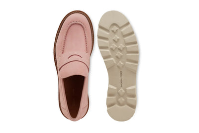 Pink suede penny loafer with white lug sole, shown top view and sole view on white background 
