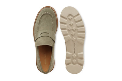 Light olive suede loafer with stitched detailing and lugged rubber sole, top and bottom view  